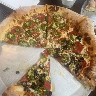 Pepperoni jalapeños green pepper pizza