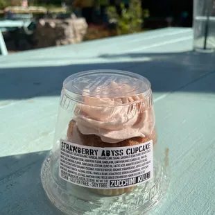 Strawberry cupcake in to-go packaging
