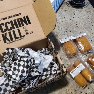 Dozen Cream Coffins