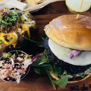 Portobello burger! This was absolutely delicious. The loaded baked potato was very tasty. The slaw, tasty!