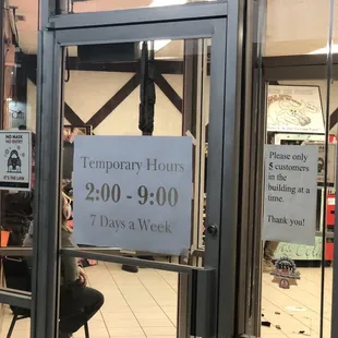 a sign in the window of a restaurant