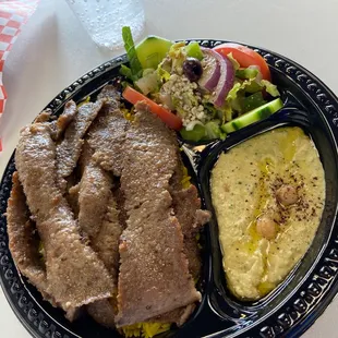 gyro platter with jalapeno hummus and a dash of olive oil