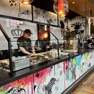 a chef preparing food in a restaurant