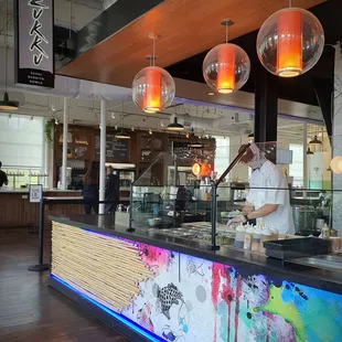 a chef preparing food in a restaurant