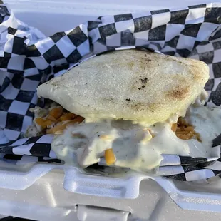 This. Was. Delicious! Tender chicken bits, out of this world sauce and cheesy cheese. (Chicken cheddar arepa)