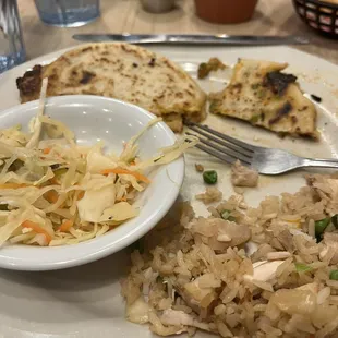 Pork and jalapeño pupusas, chaufa rice, and slaw. Delicious.