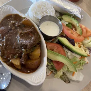 Carne Guisada! So much flavor! Homemade for sure! I asked for some Green Sauce on the side.