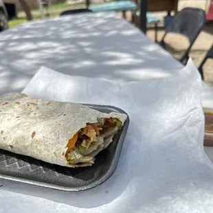 Burrito with chicken steak and peppers