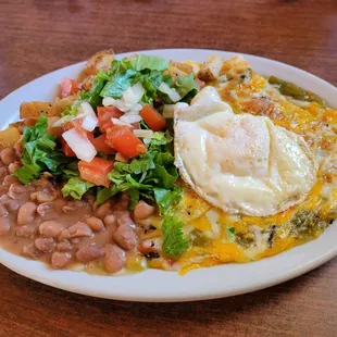 Breakfast enchiladas with green chile
