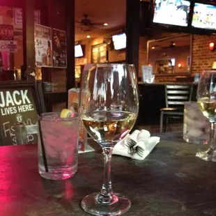 two glasses of wine on a table