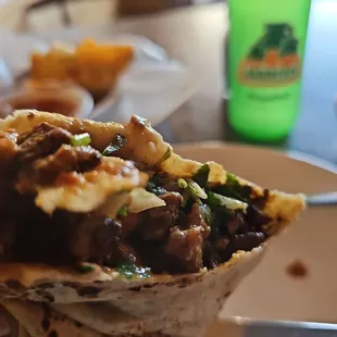 Asada burrito.. get some salsa on it and not talking about the one with the chips.