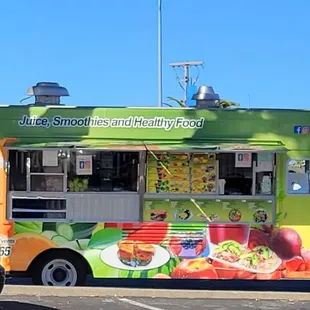 a food truck parked in a parking lot