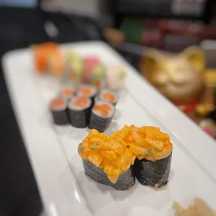 a plate of sushi on a table