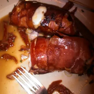 Delicious chicken stuffed with rosemary and mozerella baked in prosuitto. Glad I went back. Try the penne in vodka sauce