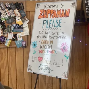 &quot;welcome to zuppaman. Please do not enter if you have symptoms of Covid 19, racism, homophobia. We (heart) you all. Enjoy.&quot;