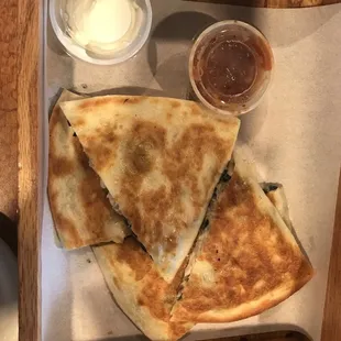 two quesadillas and a cup of coffee