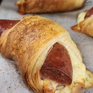 Rolled Smoke (Smoked sausage wrapped in pepper jack baked in a puff pastry! Baked Daily