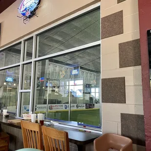 Restaurant &amp; bar area, oversees the indoor field throughout windows