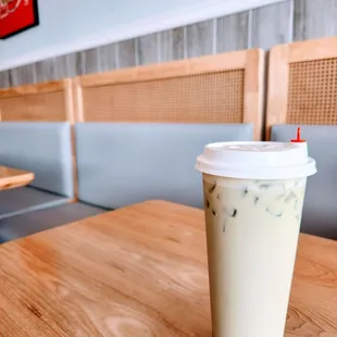 a cold drink in a plastic cup