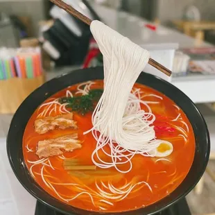 a bowl of ramen and noodles