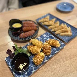 Kurobuta Sausage, (GF) Fried Inari Mochi, Potato Shrimp