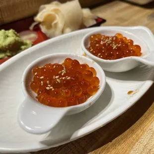 two bowls of food on a plate