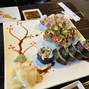 Beautiful presentation! From top to bottom: Spicy Tuna Roll, Caliente Roll, Salmon Skin Roll