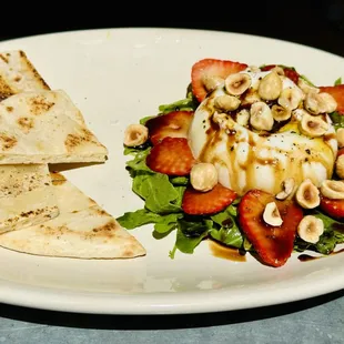 Burrata salad with strawberries.