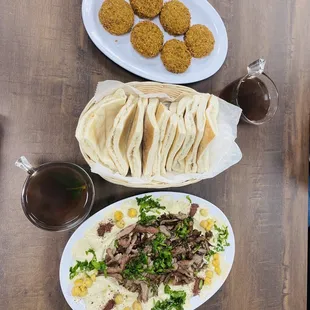 The 6 piece falafel, hummus with beef, and hot tea with mint.