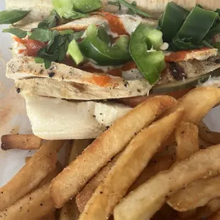 Zuzu chicken sandwich added with jalapeños &amp; fries