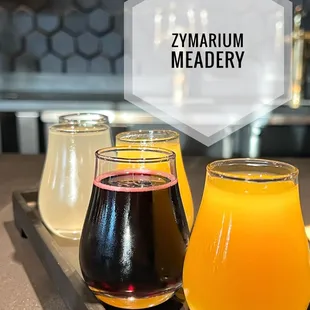 a variety of beverages on a tray