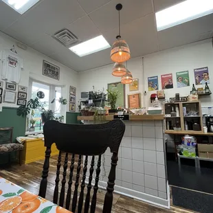 a kitchen with a table and chairs