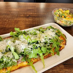 Cesar salad and lemon arugula pizza.