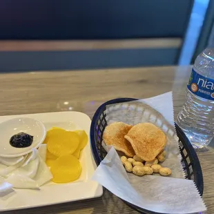 Complimentary onion &amp; black bean sauce, daikon, shrimp chips, shelled peanuts, &amp; bottled water