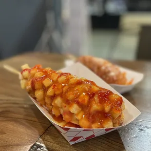 a hot dog on a stick