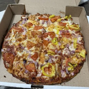 10 inch cauliflower crust with shaved Parmesan, tomatoes, onions and banana peppers. Square cut