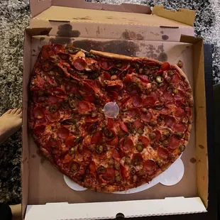 a pepperoni pizza in a box