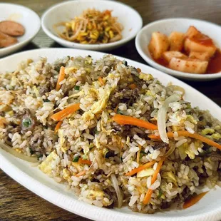 a plate of rice and vegetables