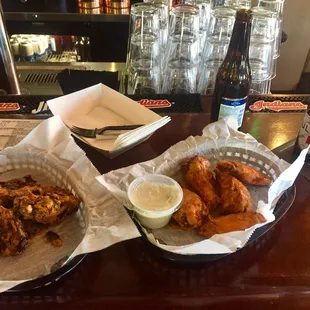 Wings &amp; sprouts tossed in buffalo bleu. Couple a Mich ultras x 2 (zuk not shown)